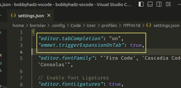 enable tab auto completions in settings json